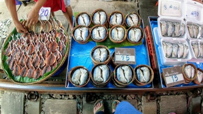 Maeklong-Railway-market-stalls-on-the-train-tracks